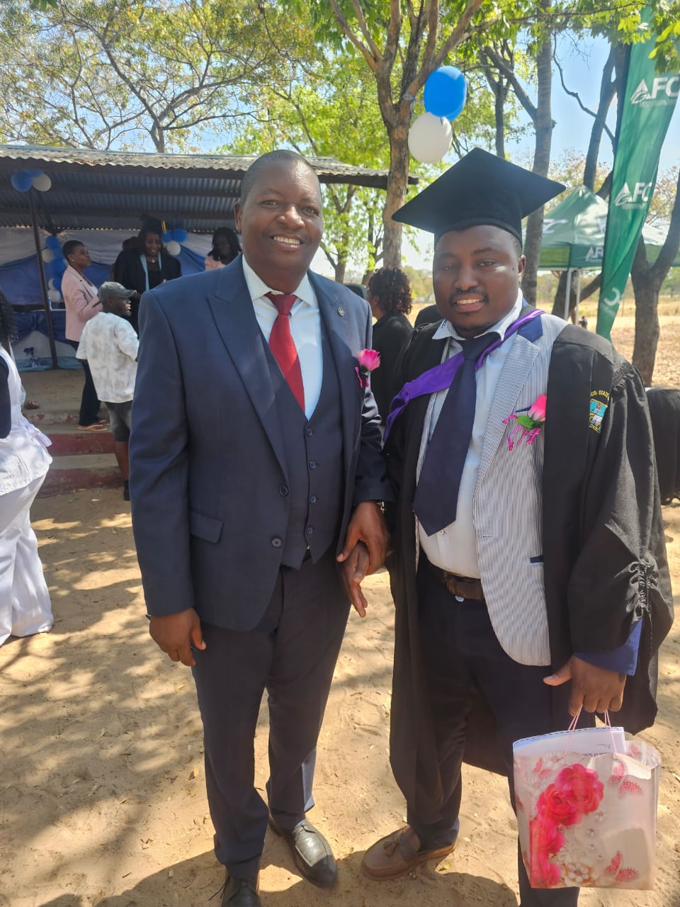 26 September 2026. Head Mr Zvidzai standing for photo shot with Colonel Rev Vudzaishe Mabuto
